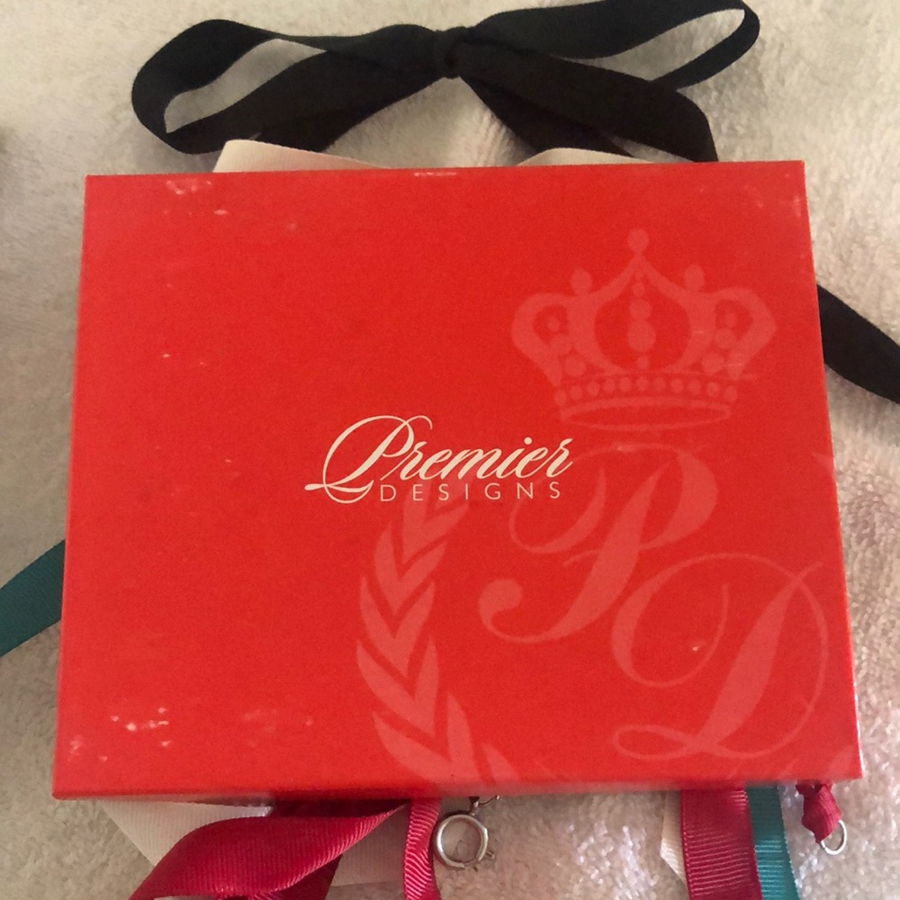 Premier Designs necklace extensions. Four pieces in black, red, teal and cream